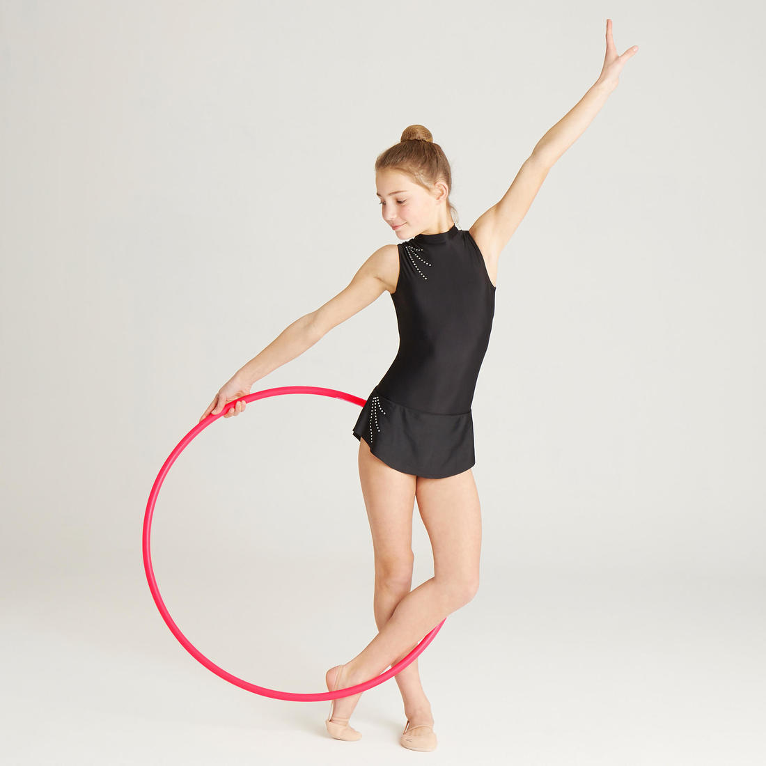 Niña haciendo gimnasia artistica