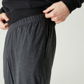 Pantalón jogger de fitness gris oscuro para hombre 100