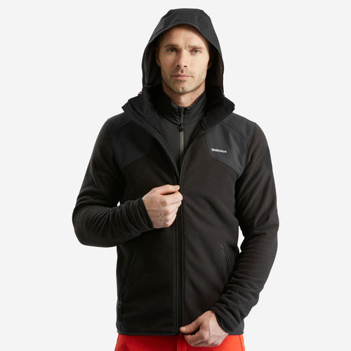





Chamarra cálida de tejido polar para senderismo negra para hombre SH500 MOUNTAIN