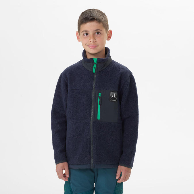 





VESTE POLAIRE CHAUDE DE RANDONNEE - MH500 BLEUE MARINE - ENFANT 7-15 ANS, photo 1 of 4