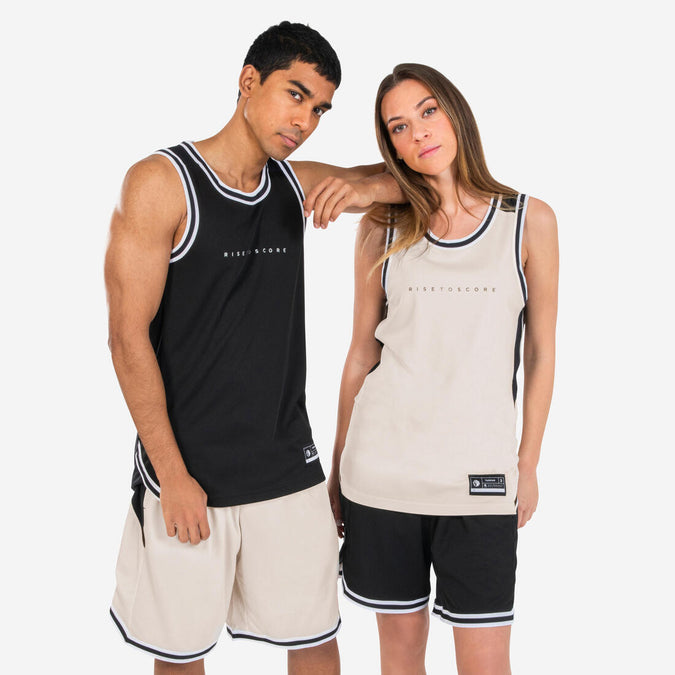 





Playera de basquetbol sin mangas reversible negra y blanca para adulto T500, photo 1 of 12