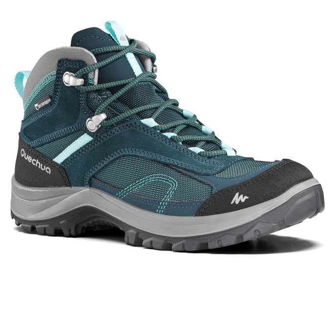 





Botas de senderismo en montaña impermeables azul turquesa para mujer MH100 Mid, photo 1 of 8